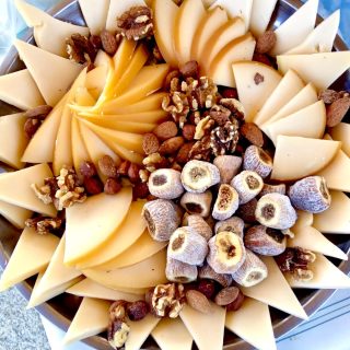 A classic Fresco Tours picnic cheese platter.